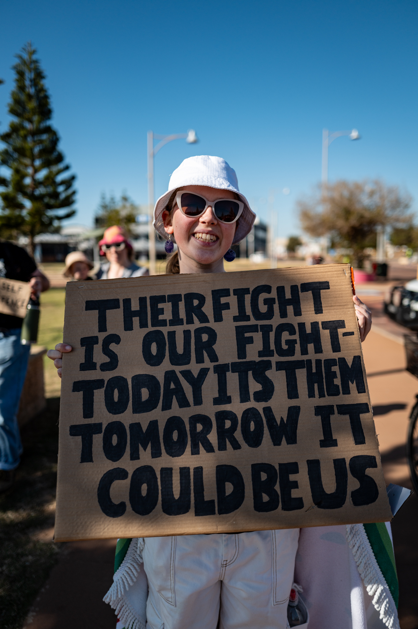 Izzy the Yamaji poses for a portrait along the foreshore of Jambinu