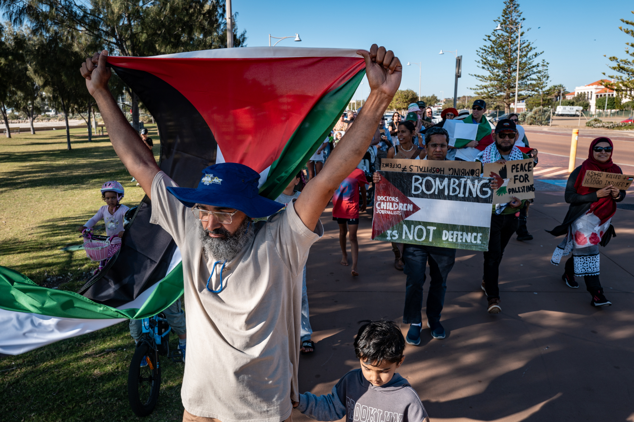 Solidarity march participants showing unity and support for Palestinian people